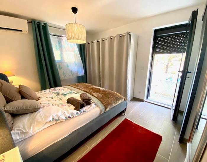Chambre parentale accès au balcon
