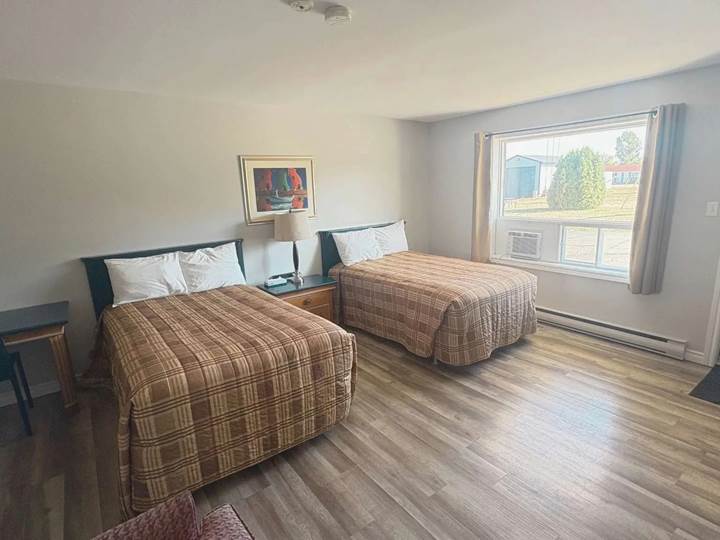 Chambre idéale pour familles avec 2 lits doubles