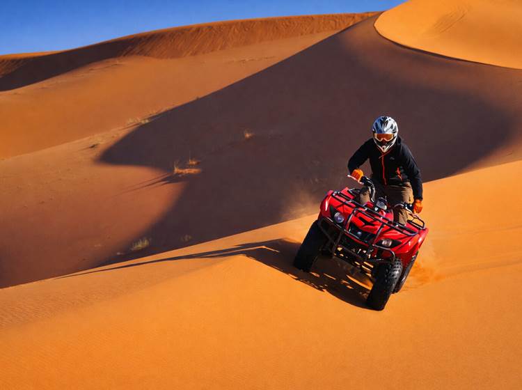 Quad dans les dunes
