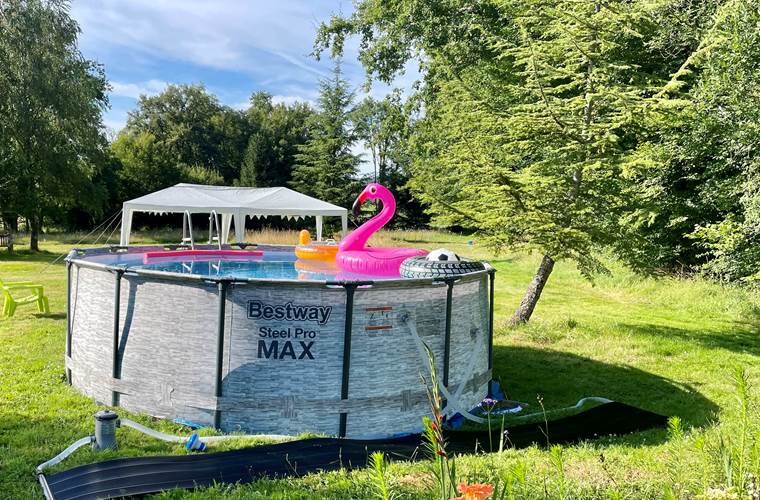 5m heated pool in the extensive gardens