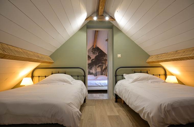 Le gite la Bergerie - La mezzanine de la chambre famille