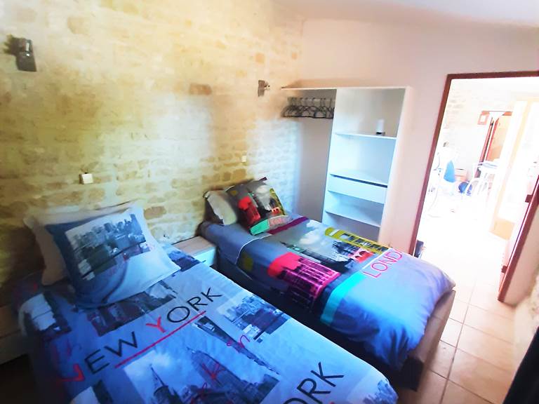 Configuration chambre en 2 lits de 1 personne