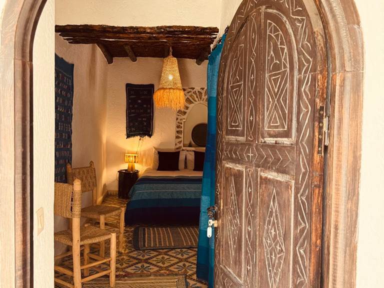 eucalyptus-hotel-ethnique-chambre-lit-double-porte-arrondi-gallery
