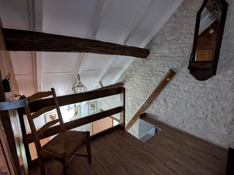Attic landing at the top of the stairs at Tuffeau Sunsets, Jaulnay Gites de Famille..