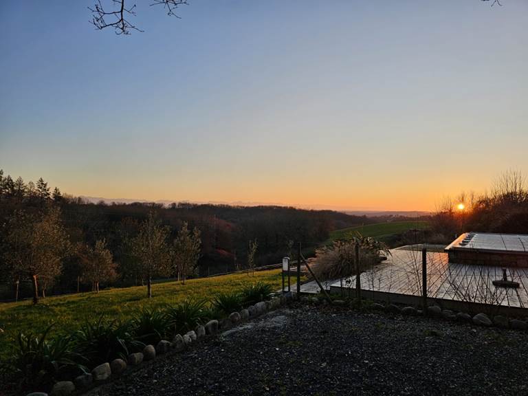 Vue piscine coucher de soleil
