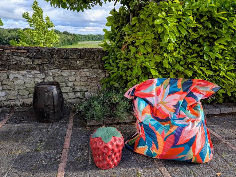 A comfy cushion invites you to relax and enjoy the fresh countryside air of the Touraine at Tuffeau Sunsets, Jaulnay Gites de Famille.