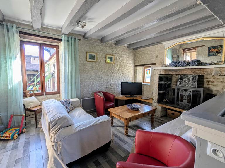 Sunlight bathes the living room at Tuffeau Sunsets, Jaulnay Gites de Famille..