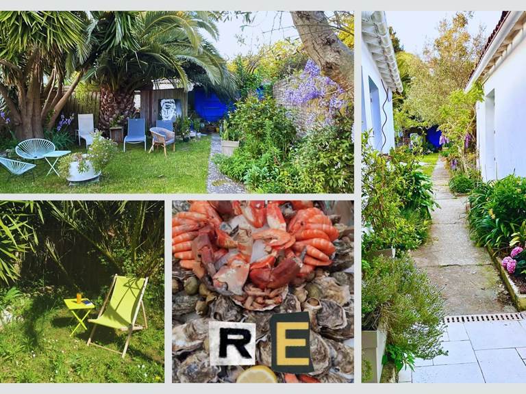 Jardin commun fleuri et convivial entre gîtes Promenez-vous entre les massifs d’hortensias et les coins ombragés, installez-vous pour un café ou un apéritif dans cet espace partagé, typique et vivant