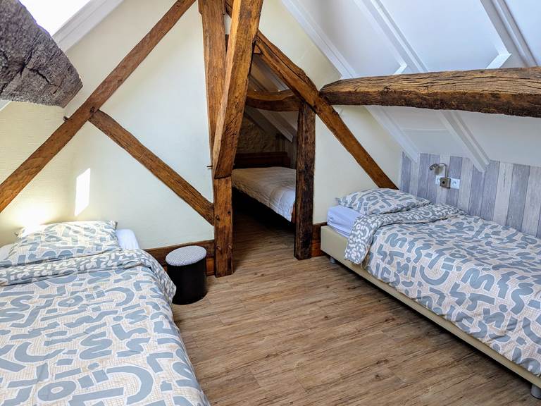 Kids bedroom in the attic at Tuffeau Sunsets, Jaulnay Gites de Famille.