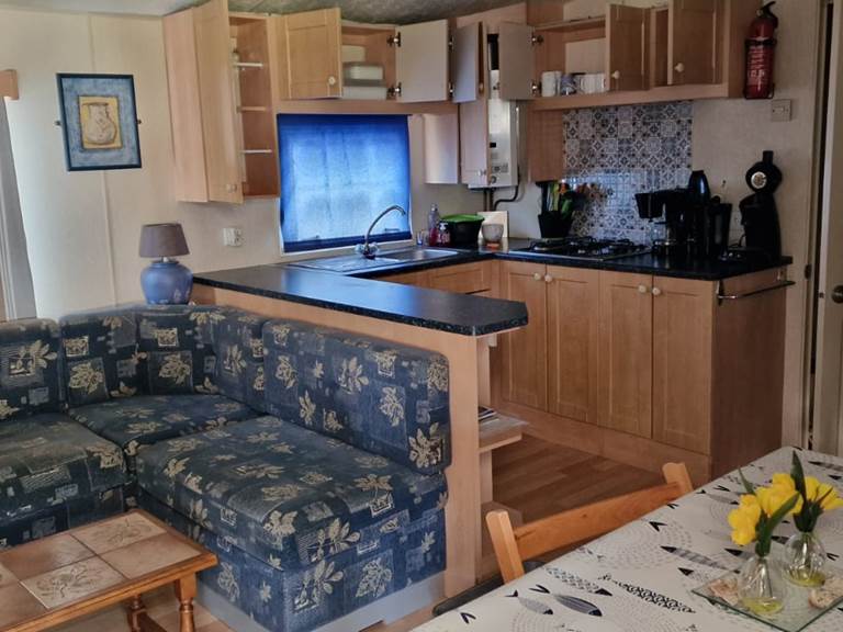 coin salon avec canapé convivial MOBIL-HOME DE PROPRIETAIRE 107