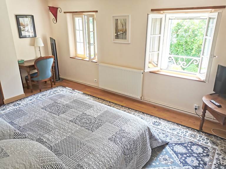 Chambre parentale de la suite Périgord