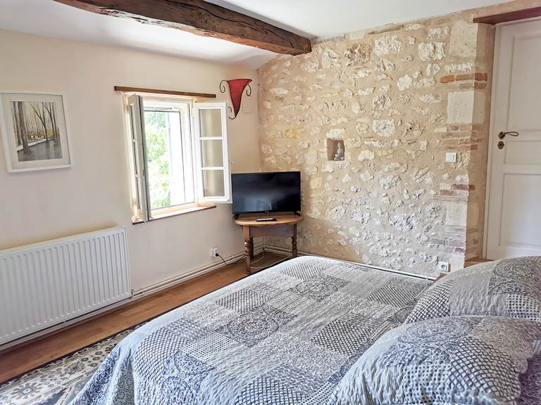 Chambre parentale de la suite Périgord