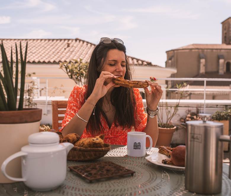 eating fougasse on the rooftop