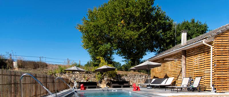 Piscine 4 x 14 Chauffée 28d° Volet roulant et deux Cascasdes (c) M Dartenset