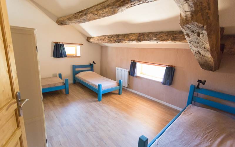 La chambre avec 3 lits simples