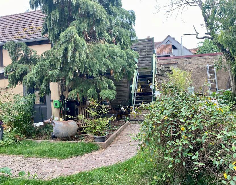 Accès chambre Campagne au calme au fond du jardin