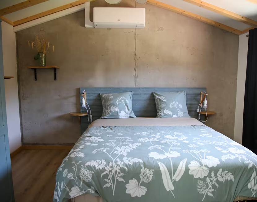 Grande chambre avec climatisation