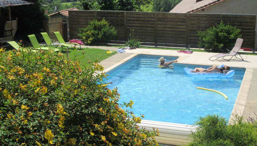 piscine chauffée 9x5 avec petit et grand bassin+ rideau de sécurité