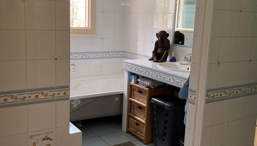 la salle de bain partagée