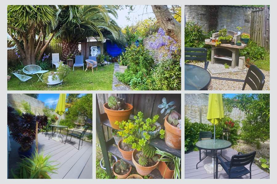Espace détente sous les palmiers avec barbecue Notre jardin commun offre un véritable havre de paix : plantes grasses, banquettes, mobilier d’extérieur et un coin barbecue pour un séjour authentique et convivial à La Flotte.