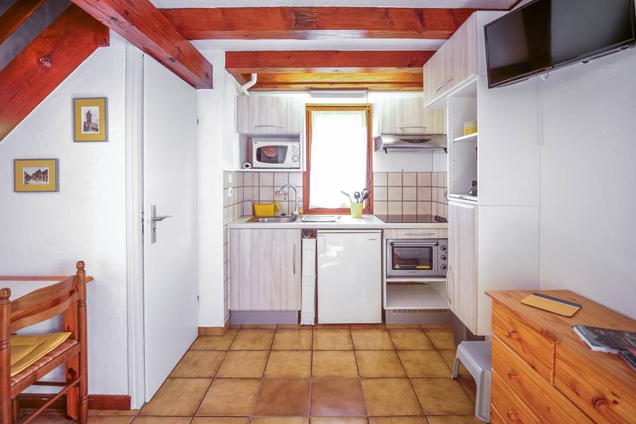 La cuisine au fond