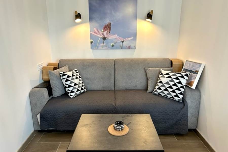 Canapé-lit fermé pour un séjour accueillant-photo-page