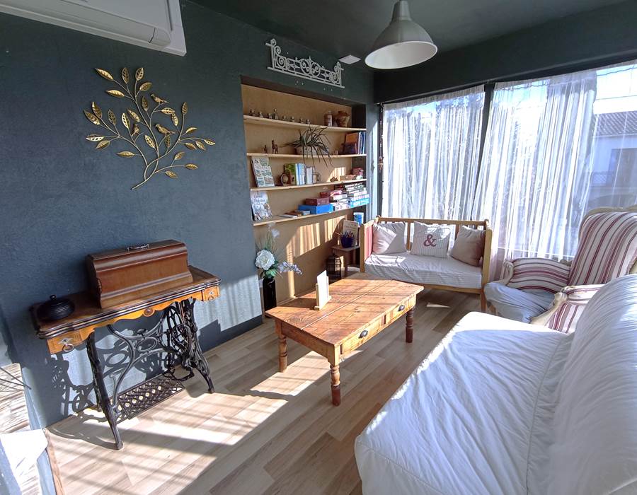 Le petit salon sous la véranda