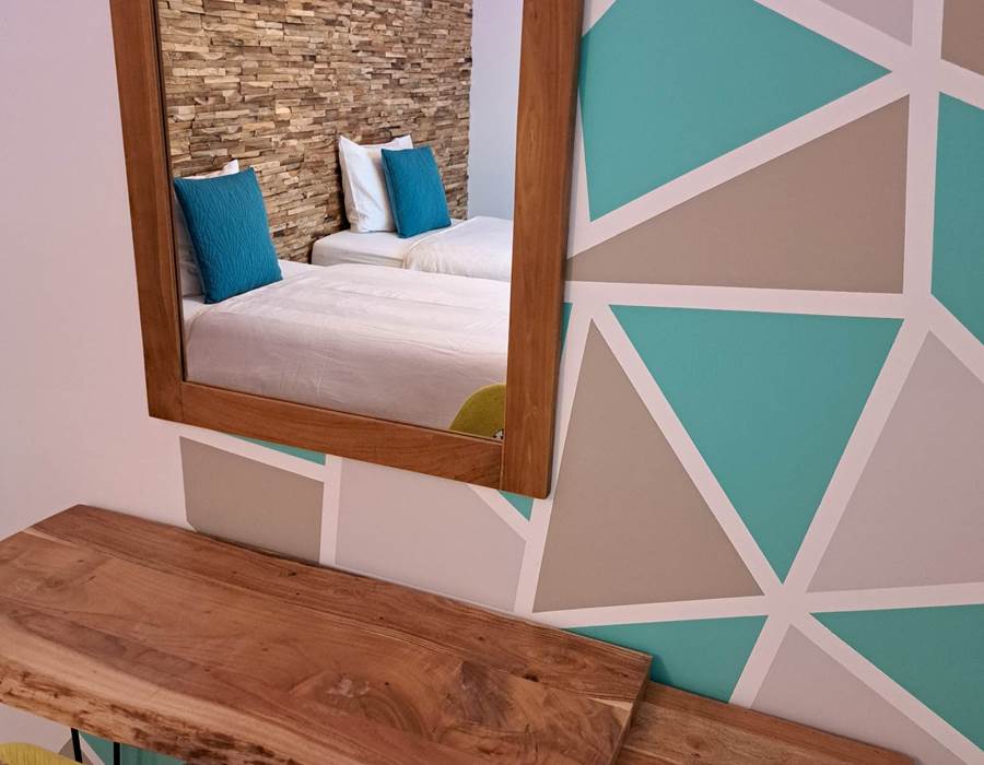 Chambre 1: Un lit double ou 2 lits simples + 1 lit bb.